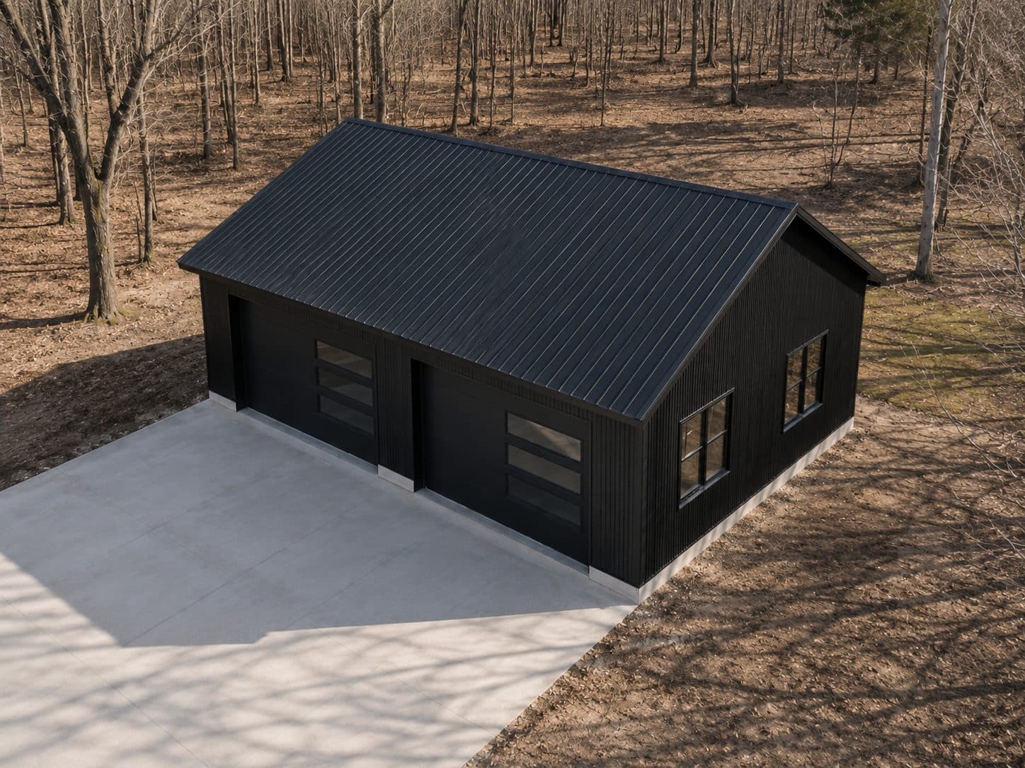 Aerial view of a 26 × 36 × 9 black steel garage